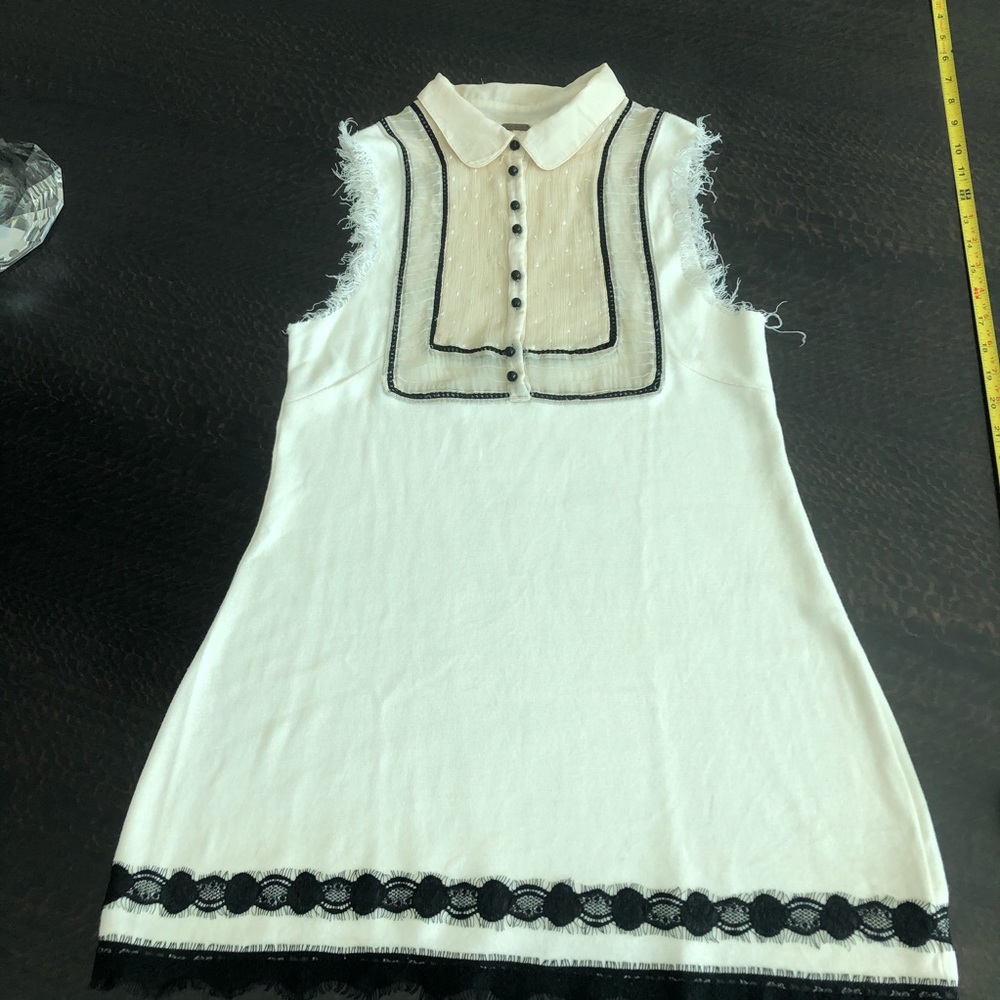 Free people off white and black blouse